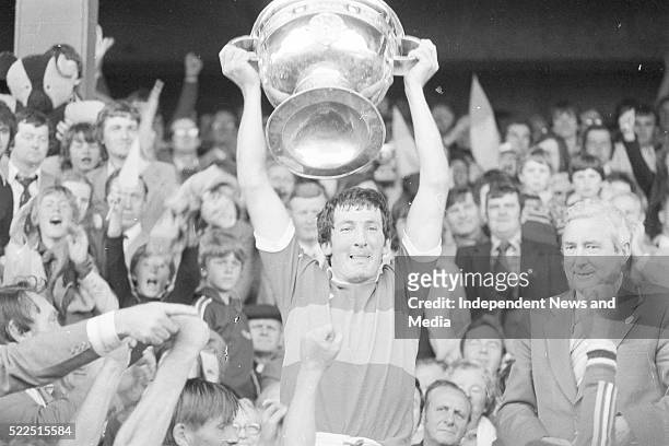 Kerry captain Tim Kennelly lifts the Sam Maguire cup after they defeated Dublin in the 1979 All-Ireland final at Croke Park, circa September 1979. .