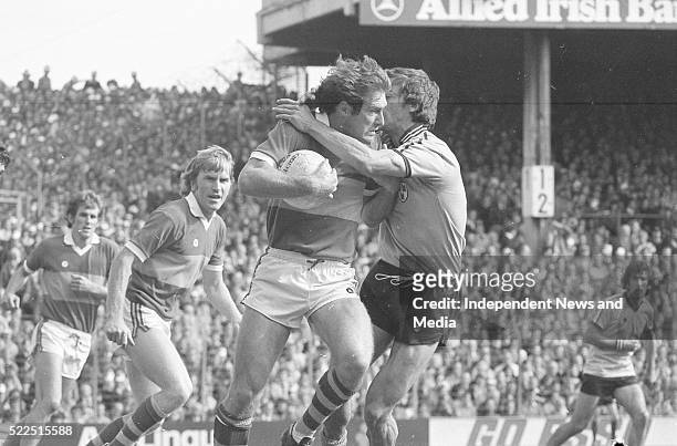 Kerry's John O'Keefe being tackled by Dublin's John McCarthy as Kerry's Mick Splianne, Jimmy Deenihan and Dublin's Bobby Doyle await the outcome at...
