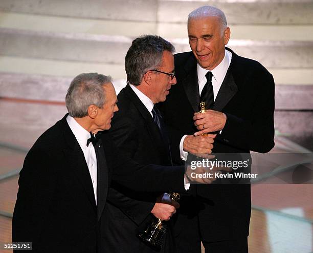 Producers Clint Eastwood, Albert S. Ruddy and Tom Rosenberg accept the award for Best Picture for "Million Dollar Baby" onstage during the 77th...