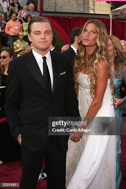 Actor Leonardo DiCaprio and Actress Gisele Bundchen arrives at the 77th Annual Academy Awards at the Kodak Theater on February 27, 2005 in Hollywood,...