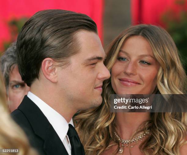 Actor Leonardo DiCaprio and Actress Gisele Bundchen arrives at the 77th Annual Academy Awards at the Kodak Theater on February 27, 2005 in Hollywood,...