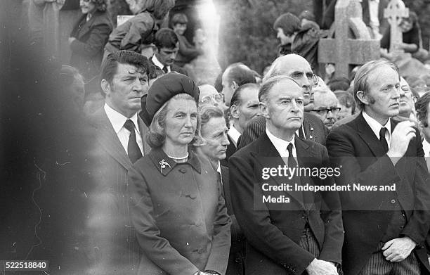 Taoiseach Liam Cosgrave,TD his wife Vera and Michael O'Kewdnnedy,TD and members of the FF party at the burial of the late President Eamonn de Valera...