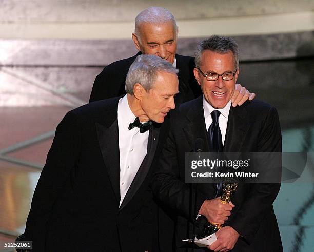 Producers Clint Eastwood, Albert S. Ruddy and Tom Rosenberg accept the award for Best Picture for "Million Dollar Baby" onstage during the 77th...