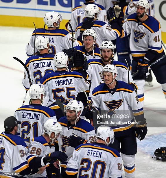 Members of the St. Louis Blues celebrate a win over the Chicago Blackhawks in Game Four of the Western Conference First Round during the 2016 NHL...