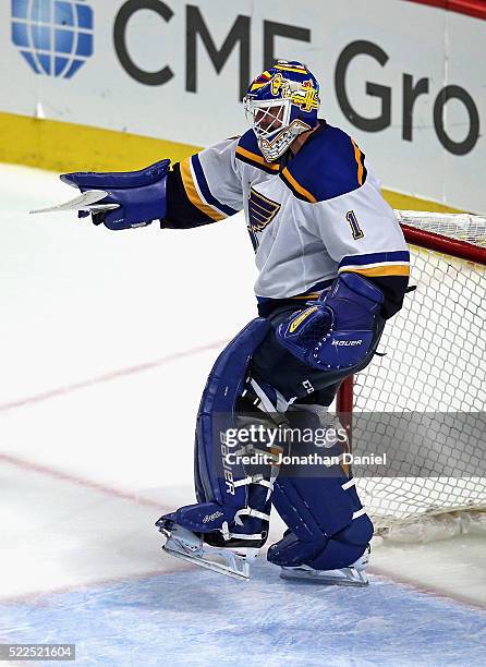 Brian Elliott of the St. Louis Blues celebrates a win against the Chicago Blackhawks in Game Four of the Western Conference First Round during the...