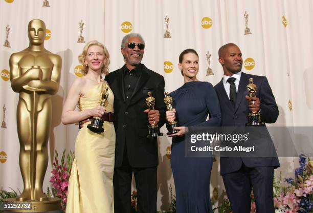Cate Blanchett, Morgan Freeman, Hilary Swank and Jamie Foxx pose for a photo backstage during the 77th Annual Academy Awards on February 27, 2005 at...