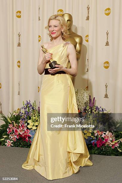 Actress Cate Blanchett poses with her "Best Performance by a Supporting Actress" award for "The Aviator" backstage during the 77th Annual Academy...