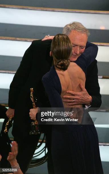Actress and fellow cast member Hilary Swank congratulates Clint Eastwood after Eastwood won for Best Director in Million Dollar Baby during the 77th...