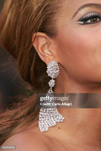 The earring of singer Beyonce Knowles is seen as she arrives at the ...