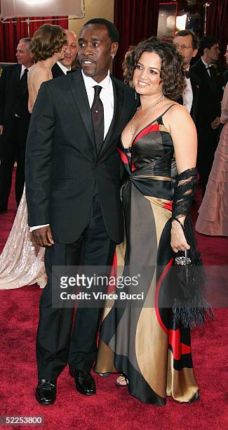 Actor Don Cheadle and wife Bridgid Coulter arrives the 77th Annual Academy Awards at the Kodak Theater on February 27, 2005 in Hollywood, California.