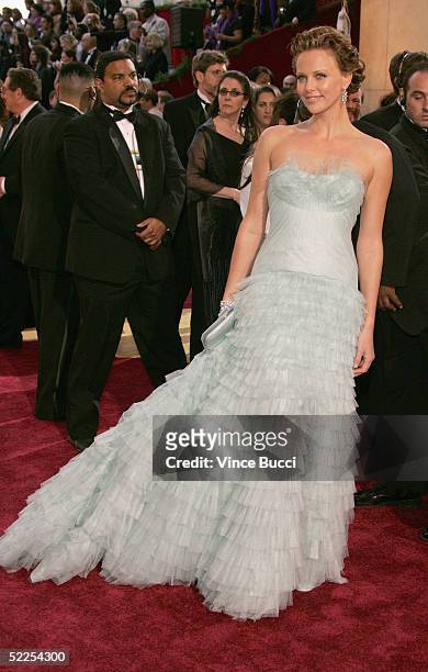 Actress Charlize Theron arrives at the 77th Annual Academy Awards at the Kodak Theater on February 27, 2005 in Hollywood, California.