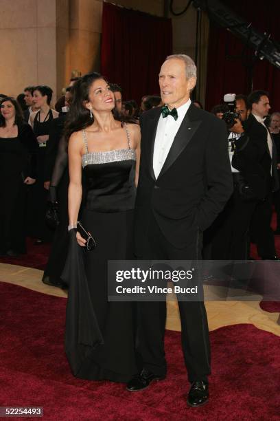 Actor/director Clint Eastwood and wife Dina Ruiz-Eastwood arrive at the 77th Annual Academy Awards at the Kodak Theater on February 27, 2005 in...