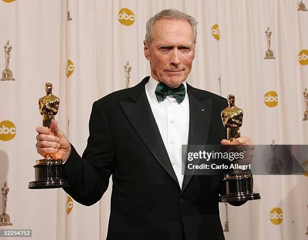 Director Clint Eastwood poses with his Oscar award for Best Director in "Million Dollar Baby" backstage during the 77th Annual Academy Awards on...