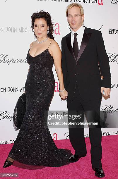 Actress Jennifer Tilly and Phil Laak arrives at the 13th Annual Elton John Aids Foundation Academy Awards Viewing Party at the Pacific Design Center...
