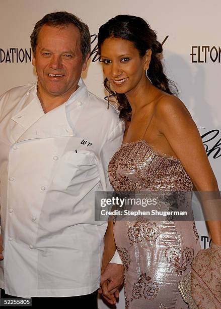 Chef Wolfgang Puck and guest arrives at the 13th Annual Elton John Aids Foundation Academy Awards Viewing Party at the Pacific Design Center on...