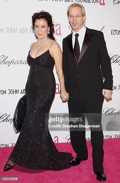 Actress Jennifer Tilly and Phil Laak arrives at the 13th Annual Elton John Aids Foundation Academy Awards Viewing Party at the Pacific Design Center...