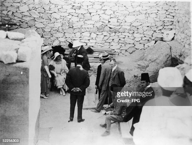 Queen Elisabeth of Belgium visits the recently opened tomb of Pharaoh Tutankhamun with her son the Duke of Brabant, later King Leopold III , Lord...