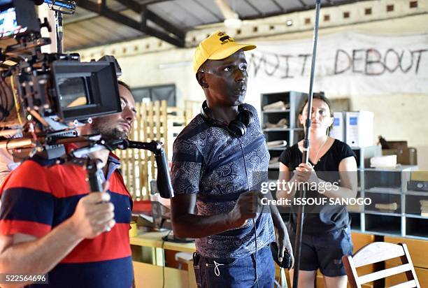 French Nigerian humorist Mamane gestures on the set of his first movie "Bienvenue au Gondwana" on April 19, 2016 in the district of Blochauss a...