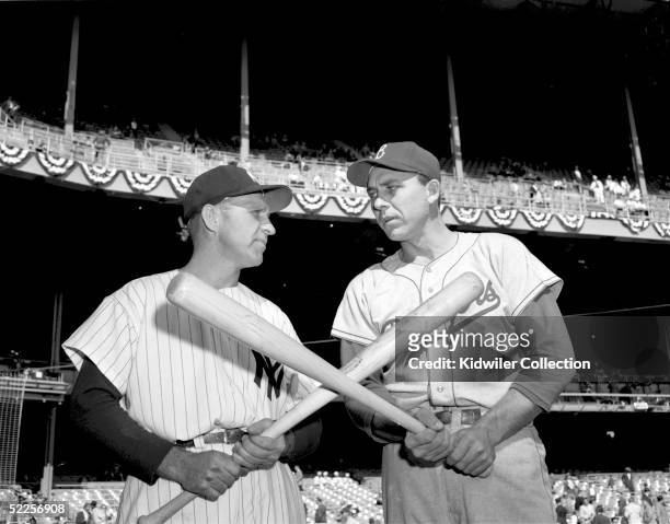 Enos Slaughter of the New York Yankees and Gil Hodges of the Brooklyn Dodgers pose for a portrait prior to World Series Game 2 on September 29, 1955...