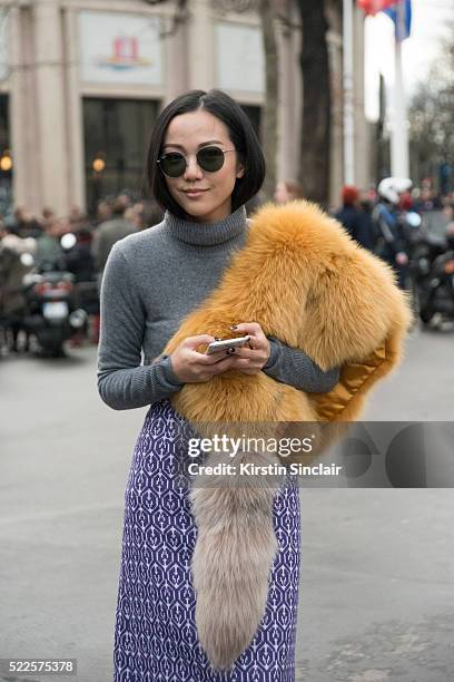 Fashion Blogger Yoyo Cao wears Miu MIu on day 9 during Paris Fashion Week Autumn/Winter 2016/17 on March 9, 2016 in Paris, France. Yoyo Cao