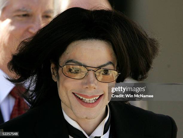 Pop star Michael Jackson leaves the Santa Barbara County Courthouse February 28, 2005 in Santa Maria, California. Opening arguments began today in...