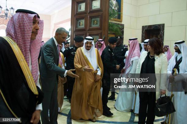 President Barack Obama is greeted by King Salman bin Abdulaziz al-Saud of Saudi Arabia at Erga Palace in Riyadh, on April 20, 2016. Obama arrived in...