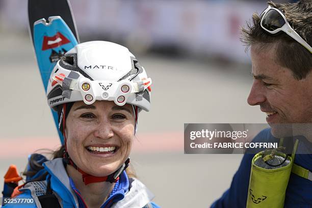 Pippa Middleton smiles next to teammate Tarquin Cooper after crossing the finish-line of the "Patrouille des Glaciers" ski mountaineering race in...