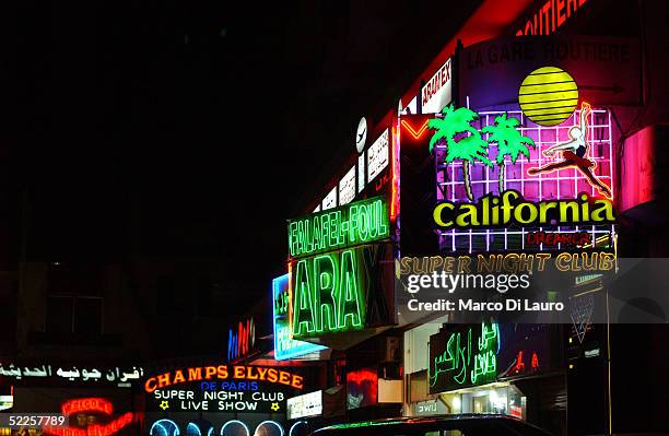 Neon signs advertise a teeming nightlife February 25, 2005 in the exclusive neighborhood of Jounieh, in central Beirut, Lebanon. With Lebanon's...