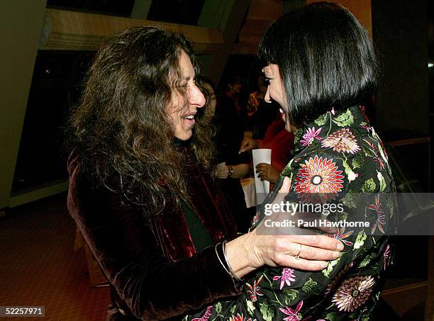 Playwright/founder of V-Day, Eve Ensler greets writer Carol Gilligan during the Launch of the Global V-Day Campaign for Justice to "Comfort Women" at...