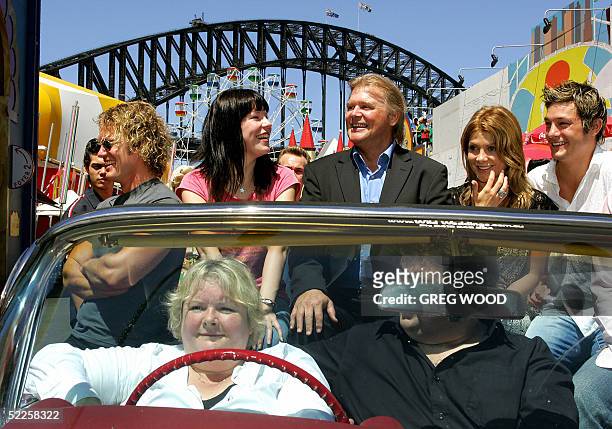 Cast members including Australian music ikon John Farnham and comedy superstar Magda Szubanski pose for a photo at the national media launch of the...