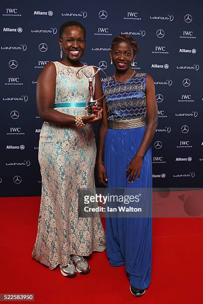 Rachel Muthoga from the project 'Moving The Goalposts' and guest attends the 2016 Laureus World Sports Awards at Messe Berlin on April 18, 2016 in...