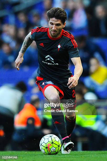 Carles Planas of RC Celta de Vigo runs with the ball during the La Liga match between Real CD Espanyol and Celta Vigo at Cornella-El Prat Stadium on...