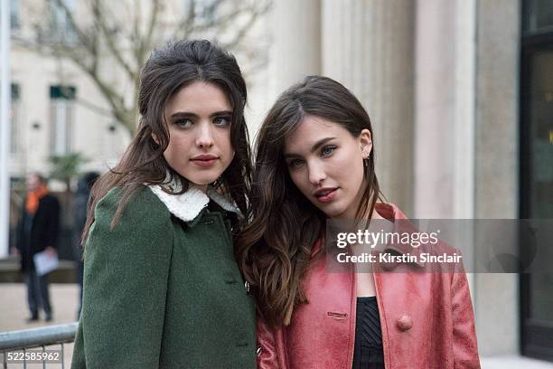 Actress Rainey Qualley weraing Miu Miu with her sister Model and Acrtress Margaret Qualley also wearing Miu Miu on day 9 during Paris Fashion Week...