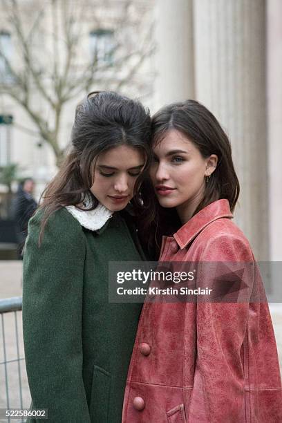 Actress Rainey Qualley weraing Miu Miu with her sister Model and Acrtress Margaret Qualley also wearing Miu Miu on day 9 during Paris Fashion Week...