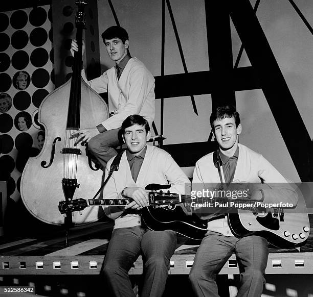 The Bachelors photographed at the BBC Dickenson Road Studio in Manchester during rehearsals for Top of the Pops, circa 1964. Left to right: John...