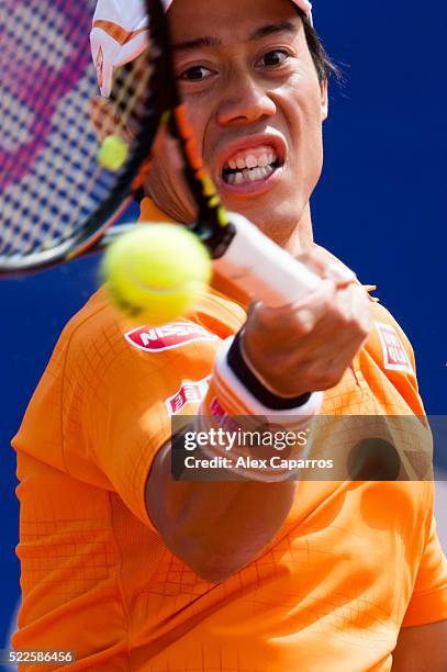 Kei Nishikori plays a forehand against Thiemo De Bakker during day three of the Barcelona Open Banc Sabadell at the Real Club de Tenis Barcelona on...