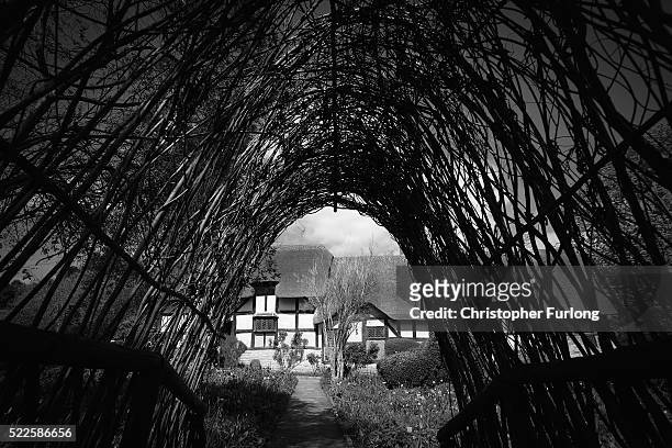 Willow scuplture sits in the garden of Anne Hathaway's Cottage on April 19, 2016 in Stratford-upon-Avon, England. 2016 is the 400th anniversary of...
