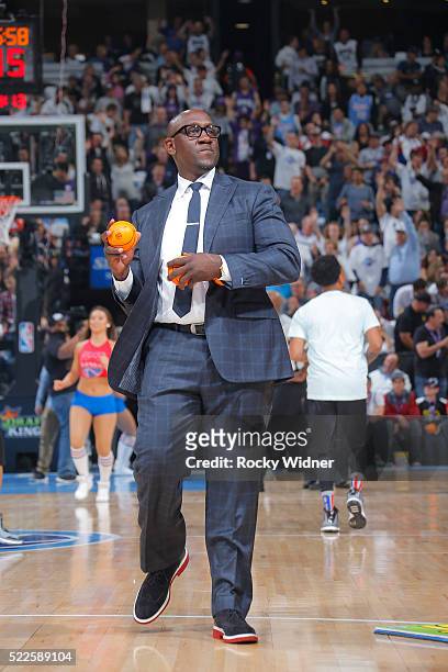 Former NBA player Bobby Jackson tosses mini basketballs out to fans during the game between the Oklahoma City Thunder and Sacramento Kings on April...