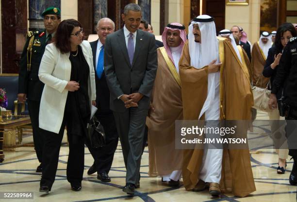 President Barack Obama speaks with King Salman bin Abdulaziz Al-Saud of Saudi Arabia at Erga Palace in Riyadh on April 20, 2016. Obama arrived in...