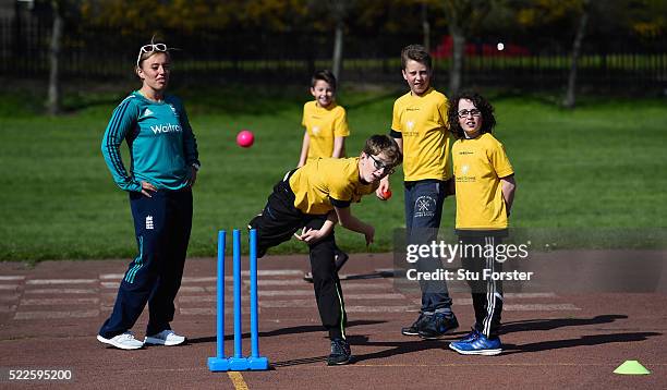 England cricketer Danielle Hazel coaches children from Ravenswood primary schooL at a Chance to Shine coaching session on April 20, 2016 in Newcastle...