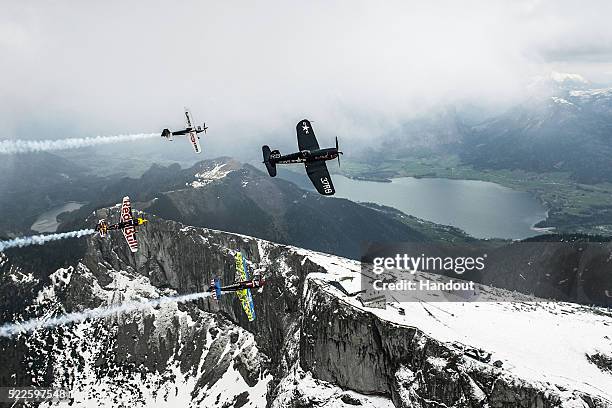 Eric Goujoun of France flying a Corsair leads Martin Sonka of the Czech Republic, Hannes Arch of Austria and Petr Kopfstein of the Czech Republic...