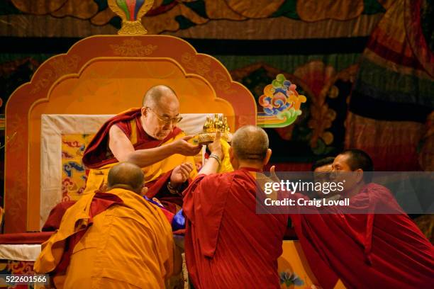 14th dalai lama blessing sacred objects - dalai lama stock pictures, royalty-free photos & images