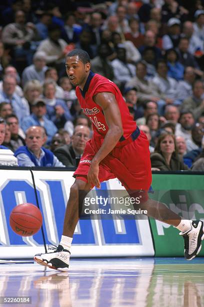 Bootsy Thornton of the St. Johns Red Storm drives the ball against the Seton Hall Pirates during a NCAA game on January 18, 2000 at Continental...