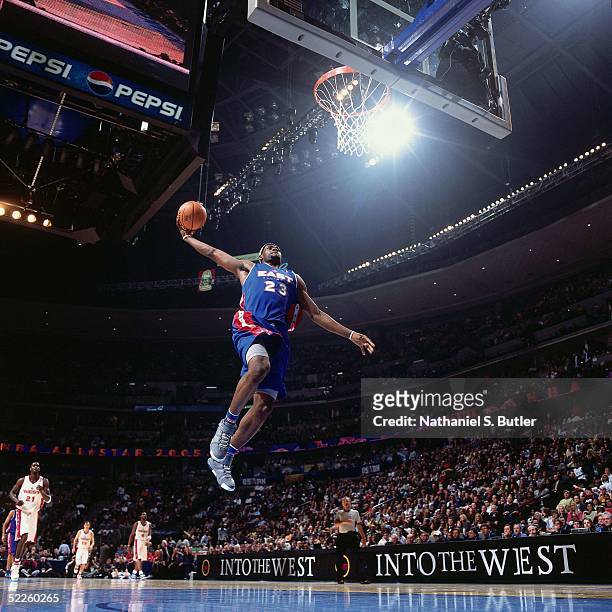 LeBron James of the Eastern Conference All-Stars dunks against the Western Conference All-Stars during the 2005 All-Star Game on February 20, 2005 at...