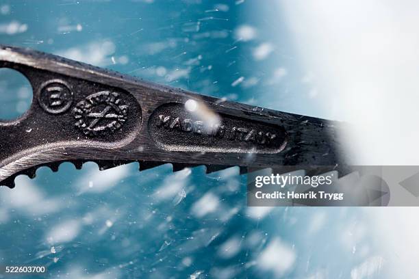 ice axe striking ice - ice pick stockfoto's en -beelden