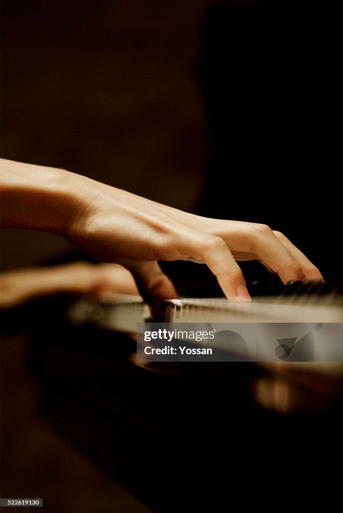 Woman Playing Piano