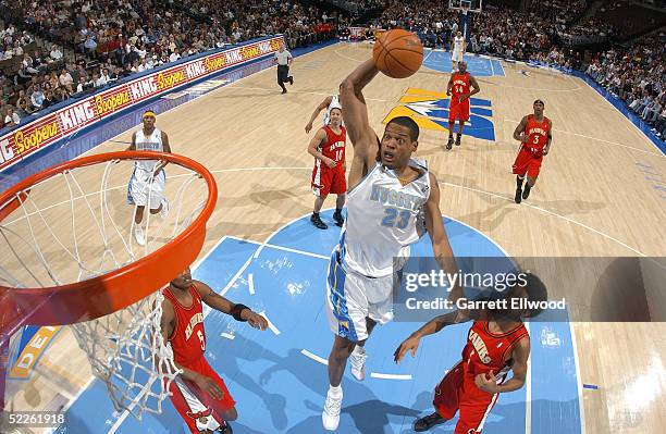 Marcus Camby of the Denver Nuggets dunks against the Atlanta Hawks on March 1, 2005 at the Pepsi Center in Denver, Colorado. NOTE TO USER: User...