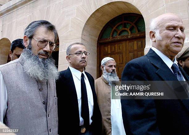 Abdul Waheed Katpar , Pakistani lawyer of Ahmed Saeed Omar - the alleged killer of US reporter Daniel Pearl - is accompanied by Omar's father Ahmed...