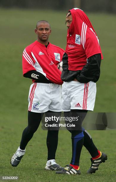George Gregan and Tana Umaga keep warm during the Southern Hemisphere training session, in preparation for this weekends IRB North v South Rugby Aid...