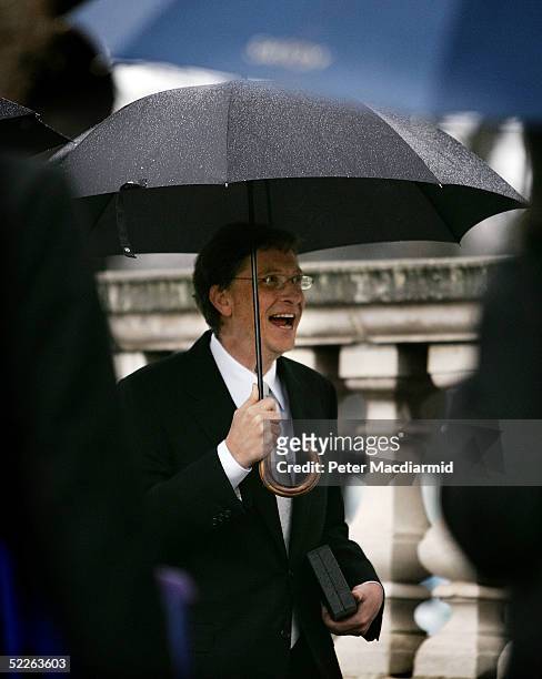 Microsoft founder Bill Gates smile during press interviews outside Buckingham Palace March 2, 2005 in London, England. Gates received the Knighthood...